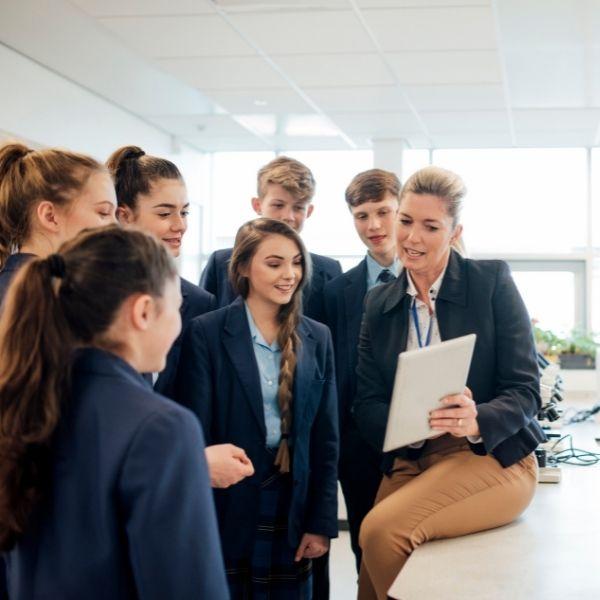 teacher delivering career services in secondary school